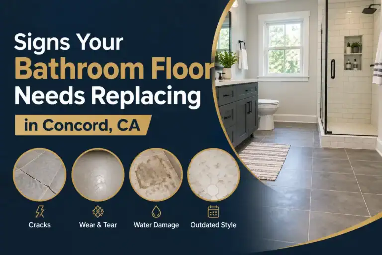 Water-damaged bathroom floor tile with visible cracking and discoloration in Concord, CA home